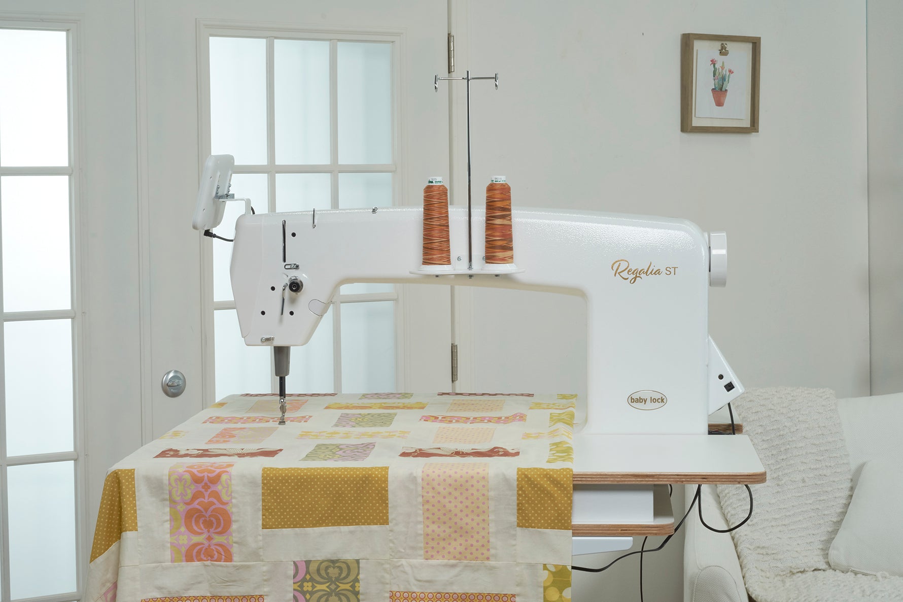 Baby Lock Regalia Stationary Machine w/Lift Table