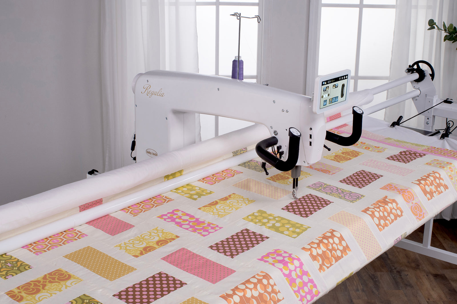 Baby Lock Regalia w/ Maestro Frame
